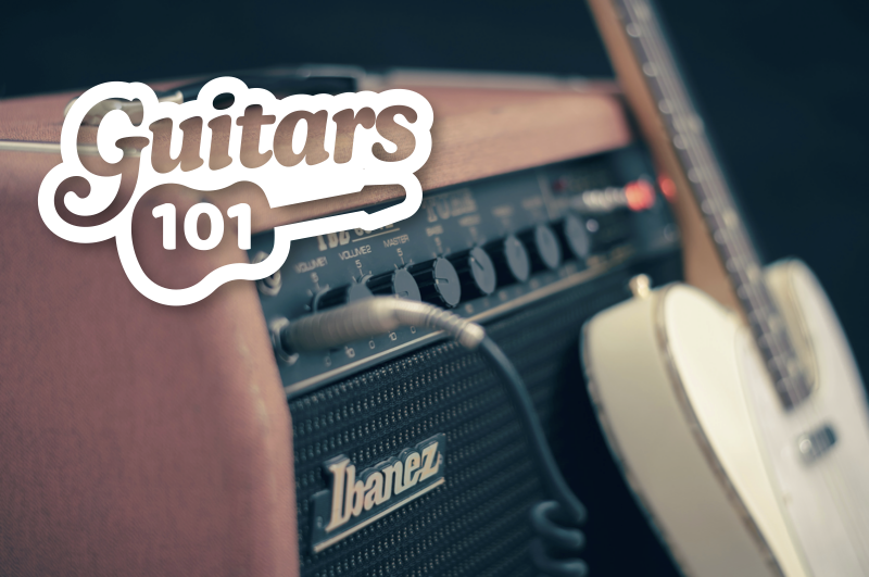 Ibanez electric guitar plugged into a guitar amp